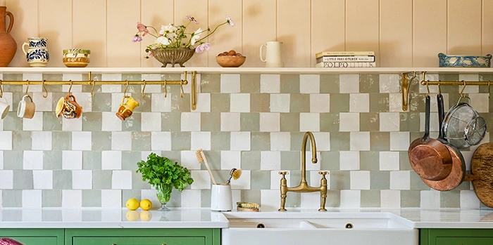 Zellige kitchen backsplash in green and white
